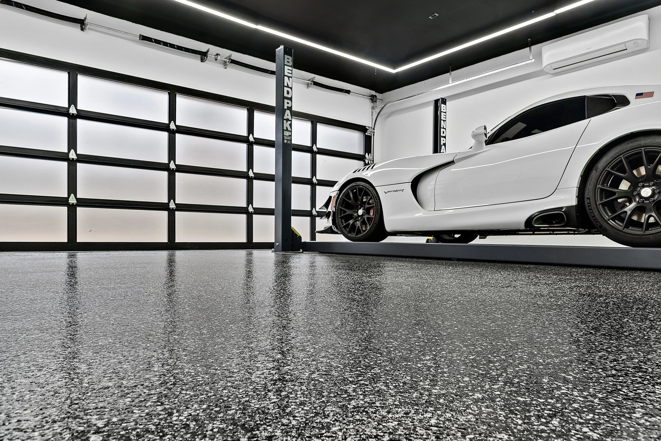 Garage with decorative flake epoxy flooring